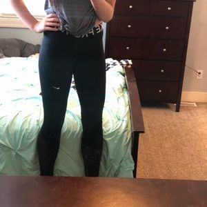 Black Nike athletic leggings.